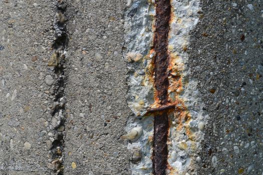 abstract background or texture rusty steel rebars in old concrete