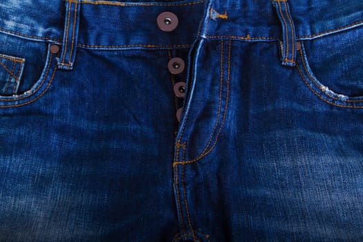 New blue jeans pocket in close up