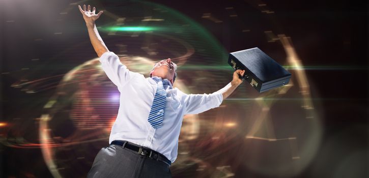 Businessman holding briefcase and cheering against global technology background in orange