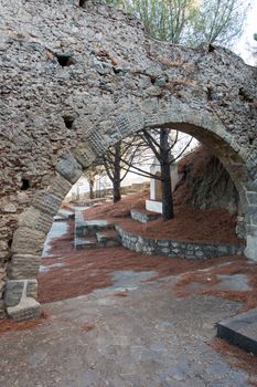 Ancient arch on the hill in eastern Sicily