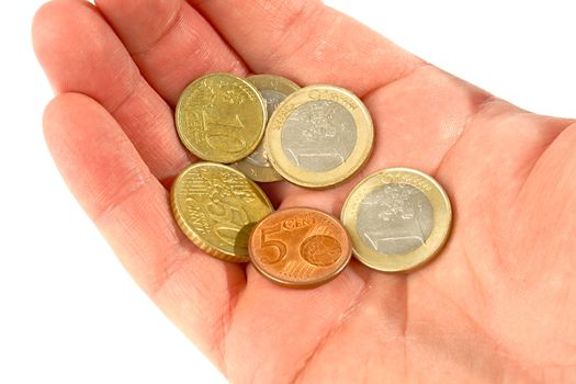 Euro coins in human hand
