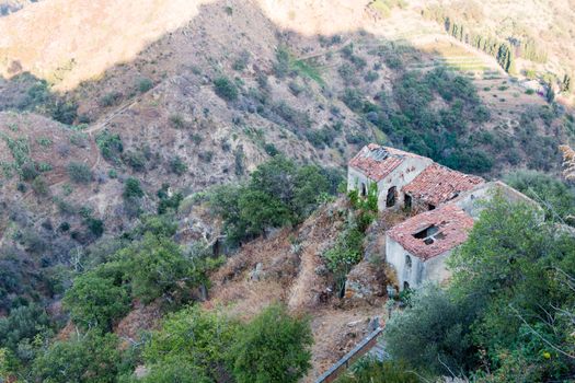 Ruins of old houses in a small Sicilian village near Taormina