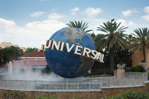 ORLANDO, FLORIDA, USA - JUNE 9, 2010: The large rotating Universal logo globe on Universal Studios is one of Orlando's famous theme parks.