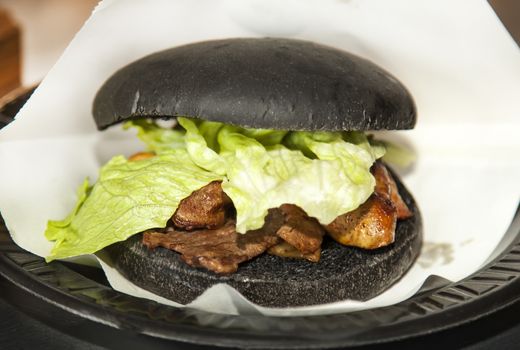 Black burger with foie gras