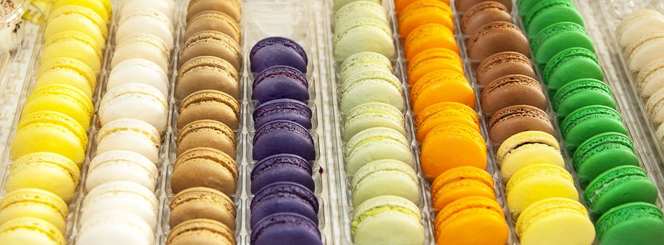 Multicolor french macarons in a rows 