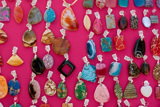 Gem stone earrings on display at arts and crafts festival