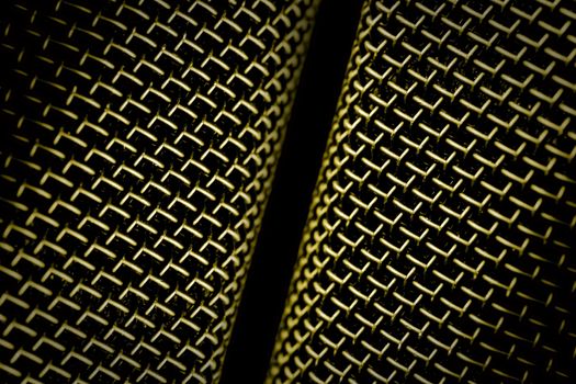 microphone mesh abstract closeup on black