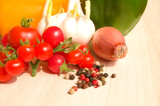 Photo shows a detail of the colourful vegetable on a table.