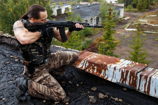 Army soldier with a gun