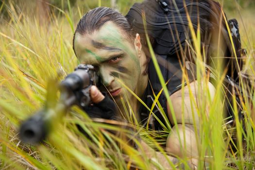 Army soldier with a gun