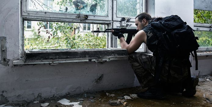 Army soldier with a gun