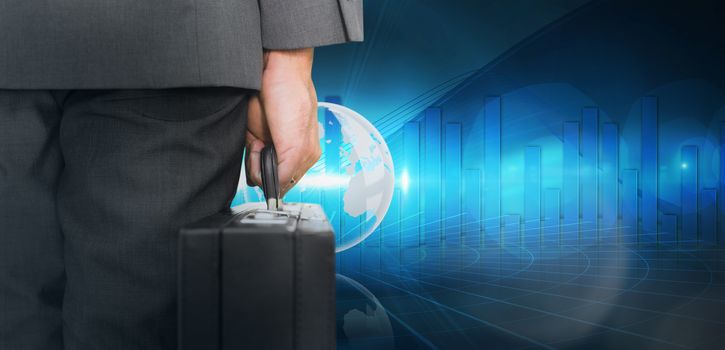 Businessman holding briefcase against global business graphic in blue