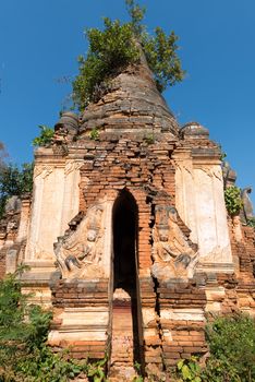 Ruins of ancient Burmese Buddhist pagodas in the village of Indein on Inlay Lake in Shan State, Myanmar (Burma).