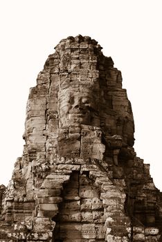 Smiling Buddha or king stone face in ancient Bayon wat temple, Angkor area, Cambodia. Isolated on white and sepia toned.