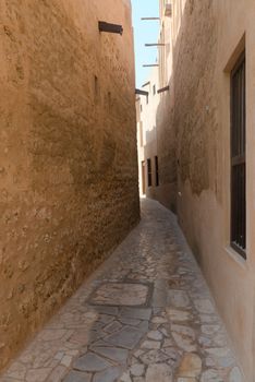 Tiny alleyways  in the old arabic merchant quarter of Bastakiya in Dubai, United Arab Emirates. 