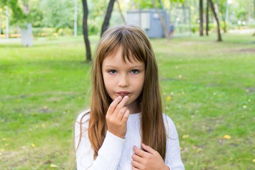 Photo of eating cute girl with long hair
