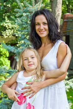 Photo of mother and daughter in white