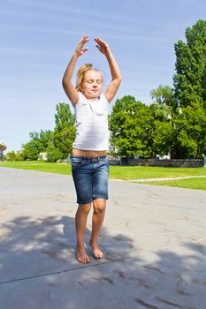 Photo of cute girl in lotus pose