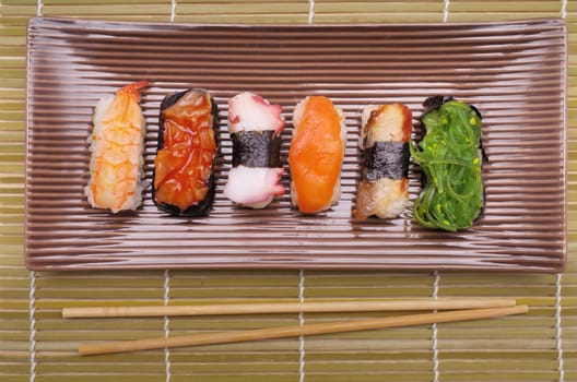 Sushi nigiri, Japanese cuisine with bamboo sticks