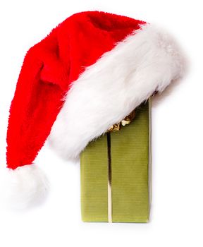 Santa hat is put on a gift box