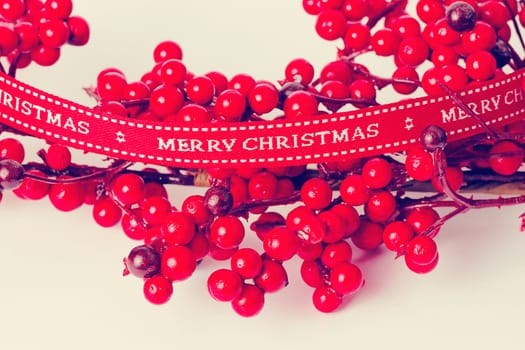 Rowan branch with ribbon Merry Christmas and gifts