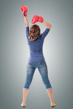 Fighting girl concept, rear view full length portrait of Asian isolated on white.