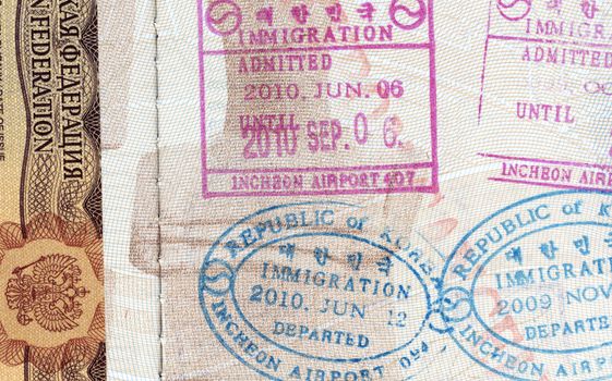 Visa stamps exit and entry - immigration arrival stamps on Greek passport