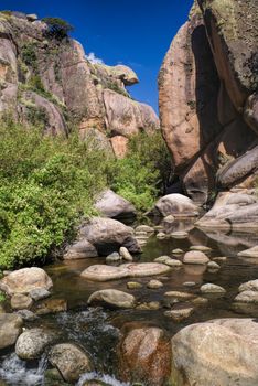 Water stream in narrow canyon in Cerro Uritorco in Argentina, South America