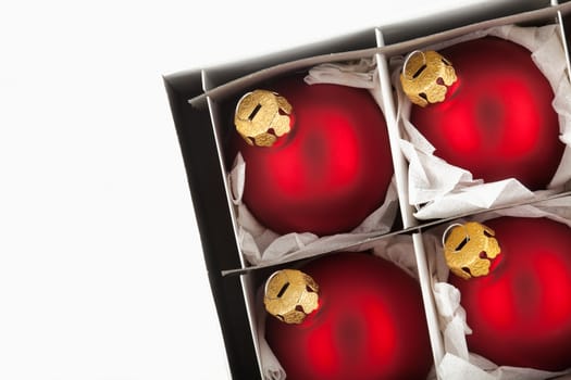 Red christmas balls in box