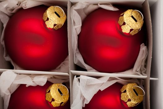 Red christmas balls in box