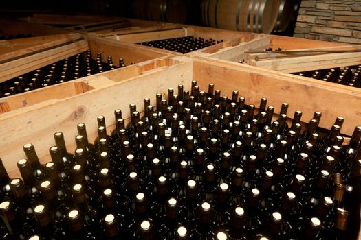 Packaged bottles of wine in large wooden crates