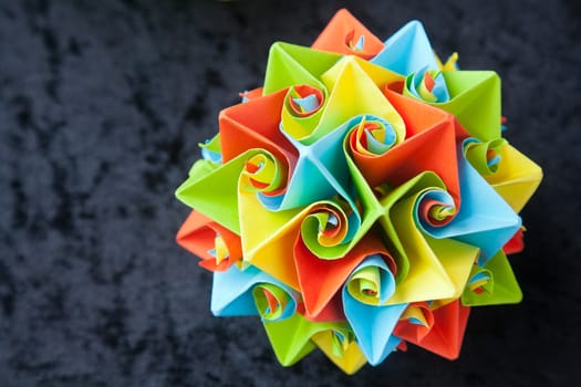 Closeup of big origami star flowers from paper with selective focus