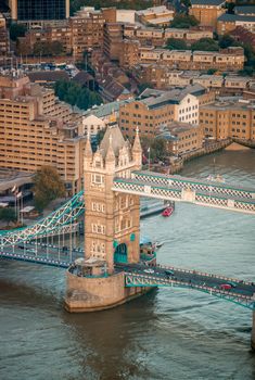 Aerial view of Tower Bridge and London skyline.