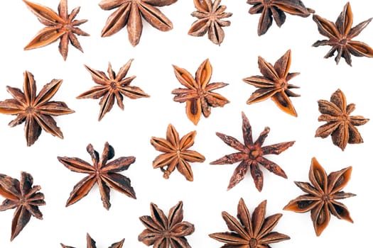 Anise stars on a white background