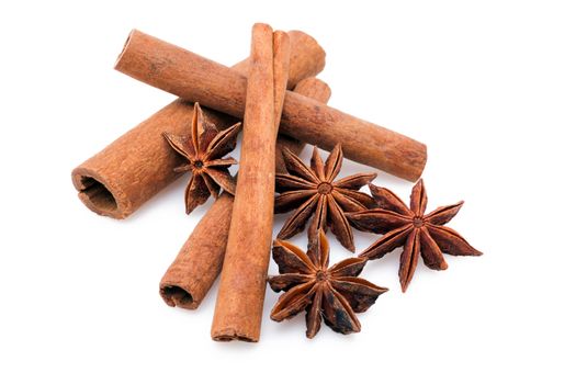 Star anise with cinnamon sticks isolated on white