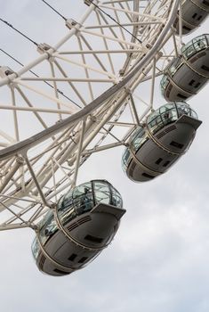 LONDON - SEPTEMBER 28, 2013: View of London Eye, Europe's tallest Ferris wheel on the South Bank of the River Thames, a famous tourist attraction.
