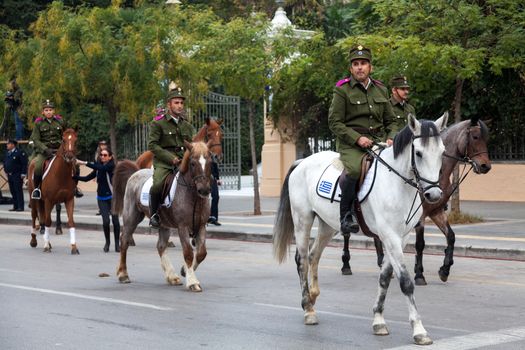 THESSALONIKI, GREECE - OCT 27:100th liberation anniversary from the City's 500 years Ottoman Empire Occupation; flown of the Greek flag on the White Tower on Oct 27, 2012 in Thessaloniki, Greece