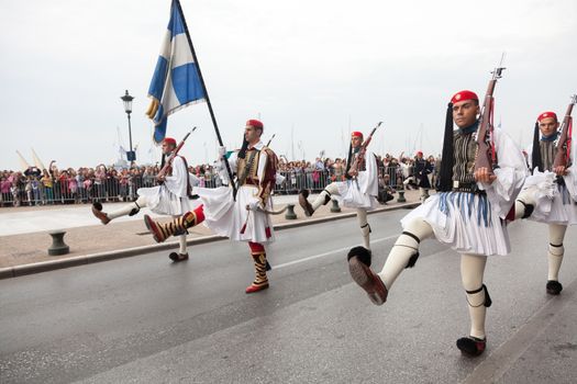 THESSALONIKI, GREECE - OCT 27:100th liberation anniversary from the City's 500 years Ottoman Empire Occupation; flown of the Greek flag on the White Tower on Oct 27, 2012 in Thessaloniki, Greece