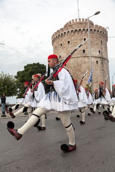 THESSALONIKI, GREECE - OCT 27:100th liberation anniversary from the City's 500 years Ottoman Empire Occupation; flown of the Greek flag on the White Tower on Oct 27, 2012 in Thessaloniki, Greece