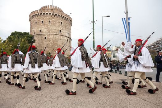 THESSALONIKI, GREECE - OCT 27:100th liberation anniversary from the City's 500 years Ottoman Empire Occupation; flown of the Greek flag on the White Tower on Oct 27, 2012 in Thessaloniki, Greece