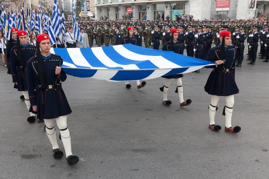 THESSALONIKI, GREECE - OCT 27:100th liberation anniversary from the City's 500 years Ottoman Empire Occupation; flown of the Greek flag on the White Tower on Oct 27, 2012 in Thessaloniki, Greece