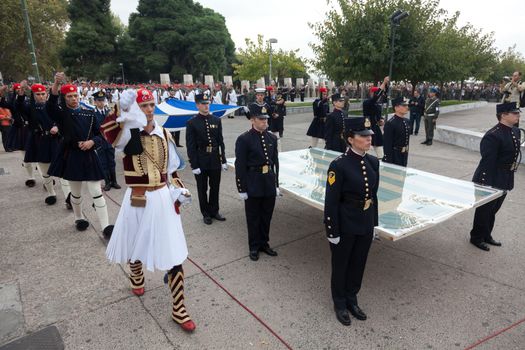 THESSALONIKI, GREECE - OCT 27:100th liberation anniversary from the City's 500 years Ottoman Empire Occupation; flown of the Greek flag on the White Tower on Oct 27, 2012 in Thessaloniki, Greece