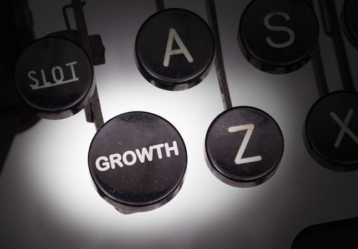 Typewriter with special buttons, growth