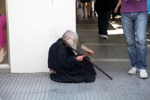 THESSALONIKI, GREECE - JUNE 28: The number of beggars in the city has increased dramatically. The economic crisis has hit the elderly on June 28, 2011 in Thessaloniki, Greece