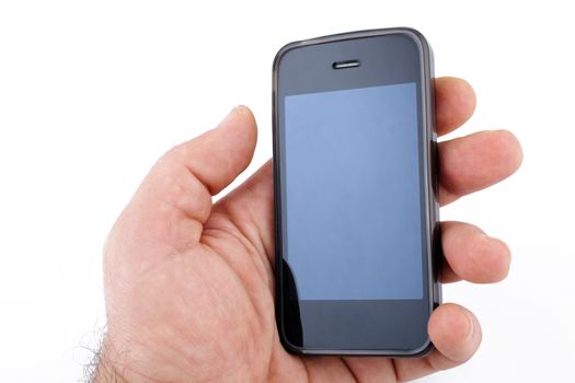 Male hand holding a smart phone mobile communicator over a white background.
