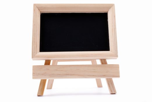 Small blackboard on easel with large space for your copy text (announcement, offer, menu)