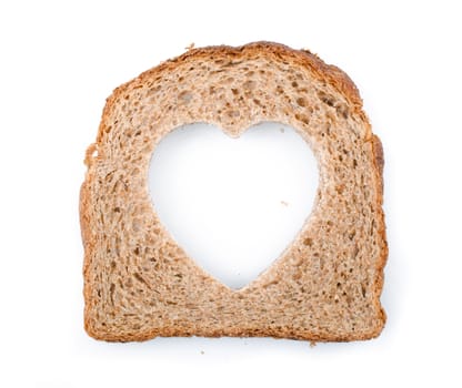 Piece of bread toast cut hole in shape of heart Isolated on white background