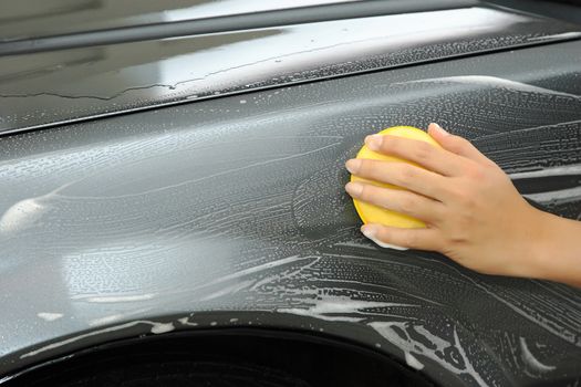 hand cleaning on the car 