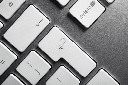 Keyboard of a notebook computer. White and silver.