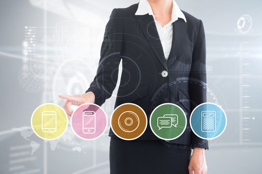 Businesswoman pointing somewhere to menu against futuristic technology interface